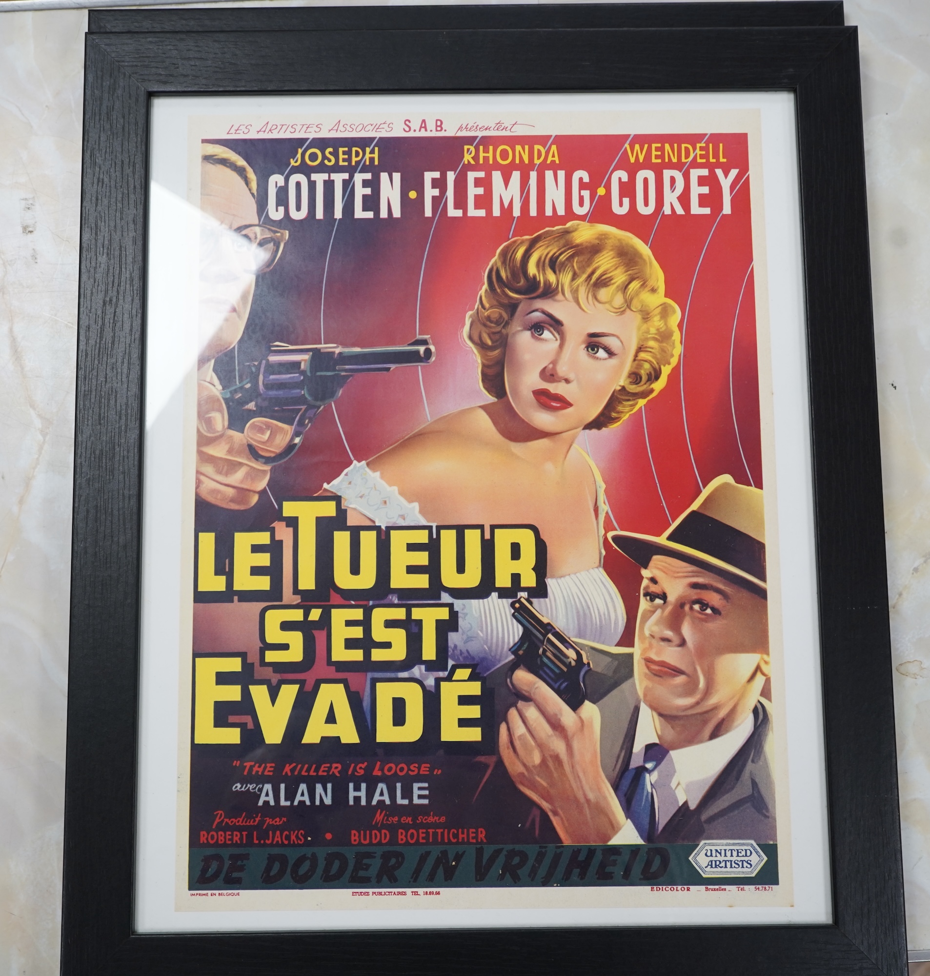 A pair of vintage Belgian film posters, one featuring Barbara Streisand and Robert Redford, printed in Brussels, framed, 48 x 36cm